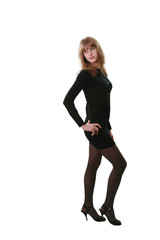 Fototapeta premium The young woman poses on a white background