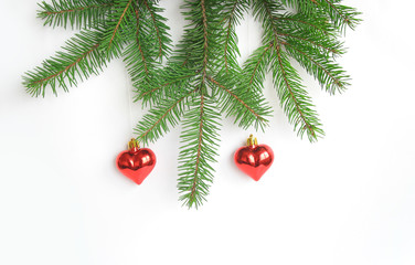 Tree branch and heart baubles isolated