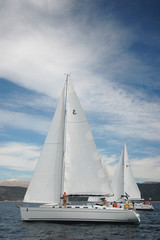 Obraz premium two white yacht sail in the greece