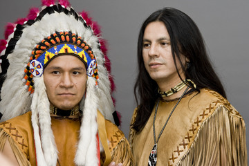 Portrait of two native americans in a studio