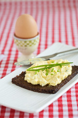 Delicious and healthy breakfast with an egg and egg-salad