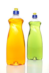 Two colourful bottles of dishwashing liquid on white background.
