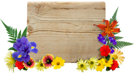 Wood sign framed by isolated flowers.
