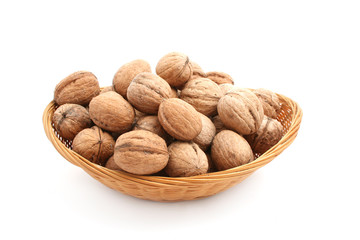 nuts in dish isolated on white