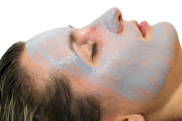 Naklejka premium Closeup of the female face with a skin mask