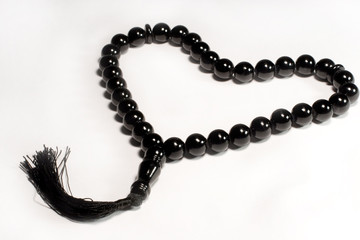 Black prayer beads (in the shape of a heart)