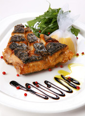 Fried flat fish slice with lemon