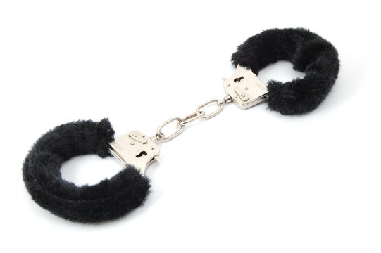 some handcuffs isolated on a white background