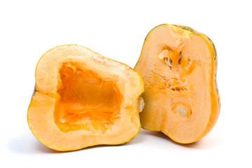 Pumpkin cut on half isolated on the white background