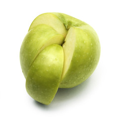 Juicy green apple cut on a part, isolated on a white background
