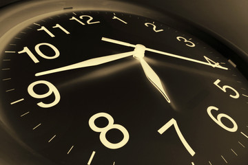 Close Up of Wall Clock in Warm Tone