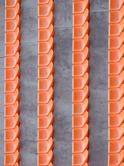 Empty tribunes of soccer stadium shot from the top