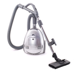 Vacuum cleaner on the white background. Old and dusty.