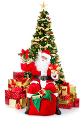 Smiling Santa and Christmas Tree. Over white background.