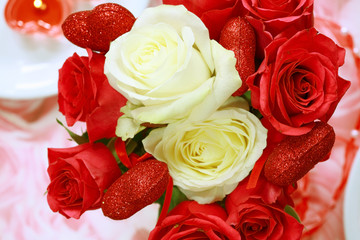 Red and white rose bouquet for Valentine with small hearts