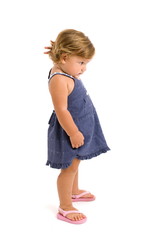 Baby with a hand in the hair, maybe thinking...