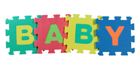 Alphabet blocks forming the word BABY isolated on white