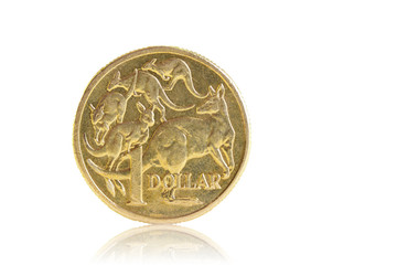 A well worn Australian dollar, isolated on white.