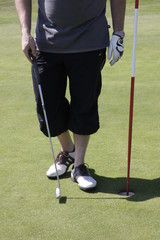 golf player during a sunny day