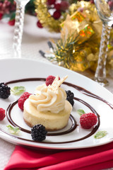 Vanilla Bean Cheesecake served with fresh berries