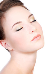 Obraz premium Young woman face close-up with closed eyes, Relaxation concept.