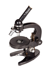 Old microscope isolated on white background