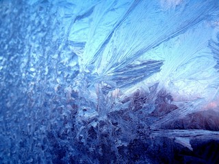Frosty pattern on window in winter season