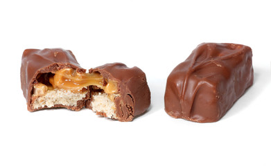 Chocolate carmel candy bars on a white background