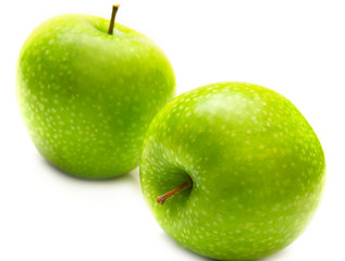 Green apples on the white background. Isolated.