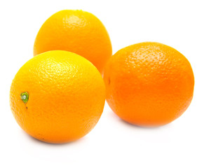 The ripe whole oranges on white, shallow DOF. Isolated