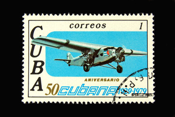 Old  Cuban postage stamp with airplane