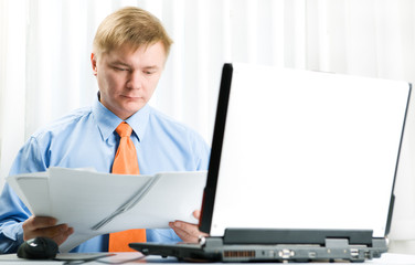 Young  businessman work on laptop