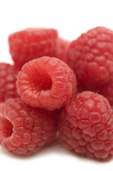fresh raspberries on white background