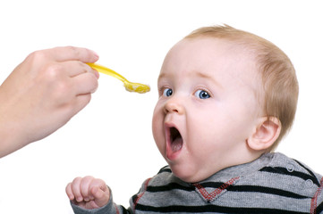 Beautiful Baby Boy Eating Baby Food