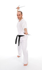 White man doing martial arts on isolated background