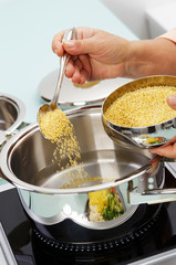 Preparing millet for cooking