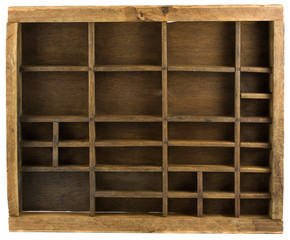 Old wooden typesetter case (drawer) isolated on white