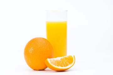 Orange with juice in the glass, isolated