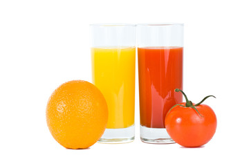 Orange and tomato fruits with juice in the glass, isolated