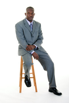 Business Man Sitting On Stool