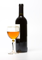 Glass and bottle of wine over white background