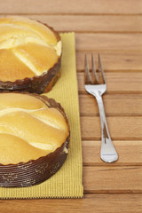 Two tasty cakes on wooden background. Shallow DOF