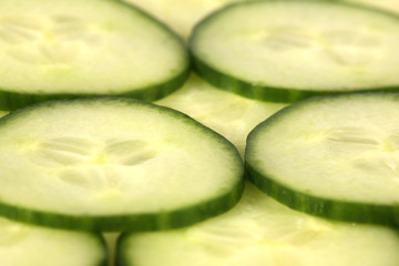 Slices of green cucumber in detailed view