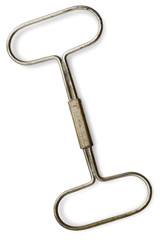 an old can opener on white with clipping path