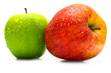Red and green apples covered by water drops on the white