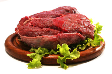 beef meat and salad over white on plate