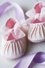 closeup pf satin baby shoes