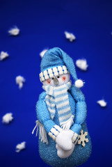 Snow-man on blue background