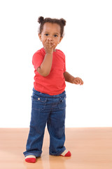 African baby throwing a kiss on a over white background