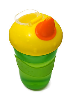 Plastic Sippy Cup, Green With Yellow Cover, Isolated On White